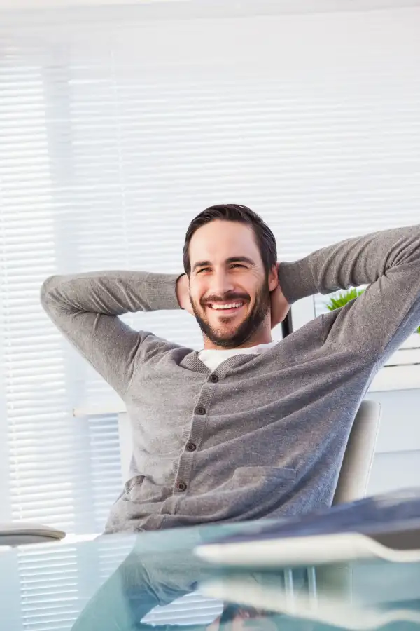 Relaxed happy man enjoying freedom from addiction