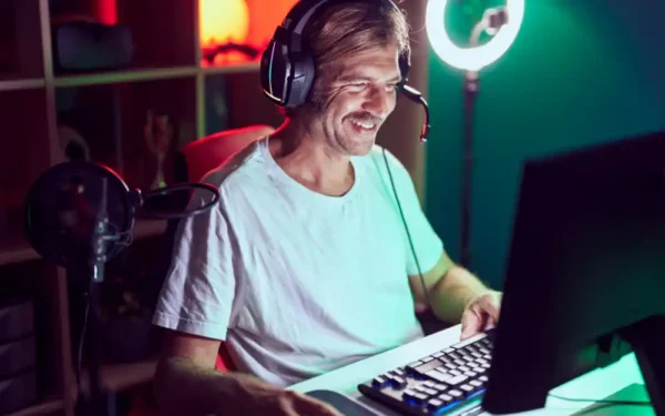 happy man playing online gaming